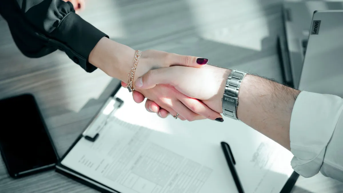 Person e-signing an agreement for bad credit loans no refusal on a tablet