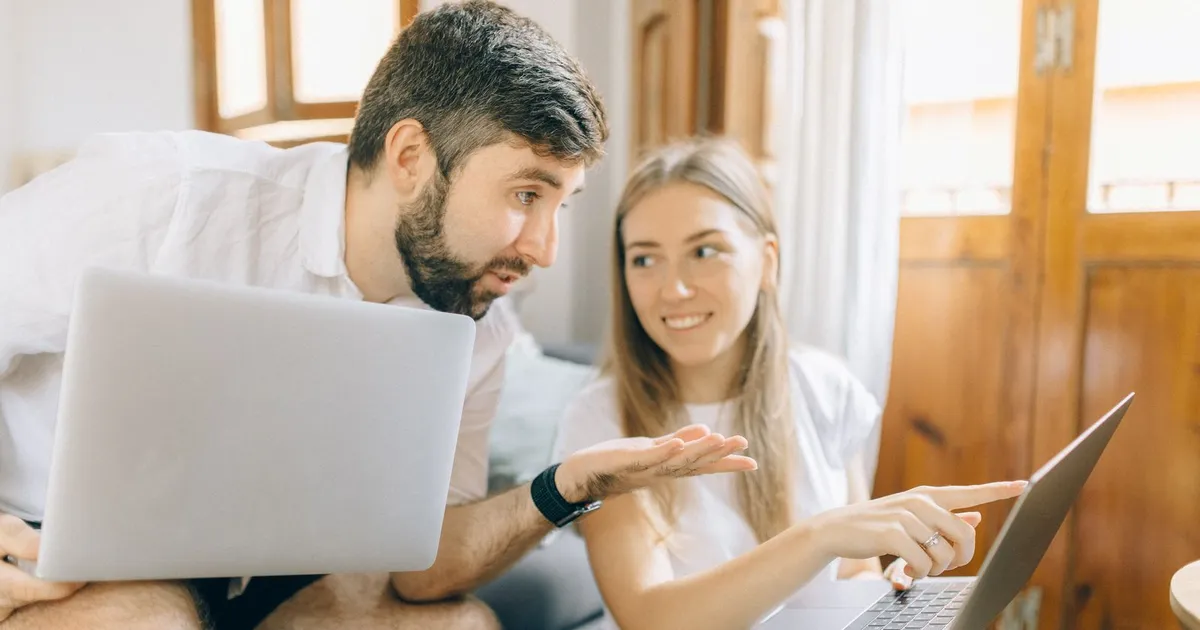 Happy person reading a guaranteed approval loans decision on their phone