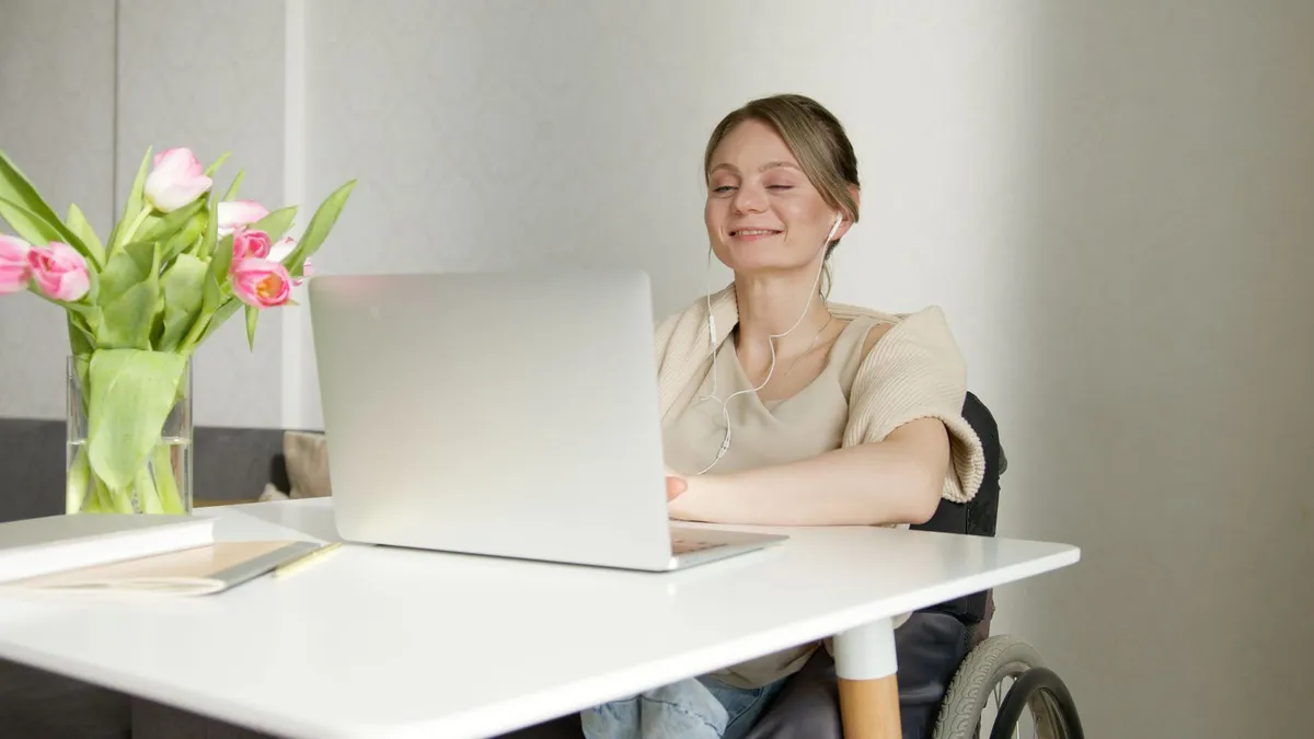 Accessible home kitchen with a phone showing an e-transfer for ODSP loans